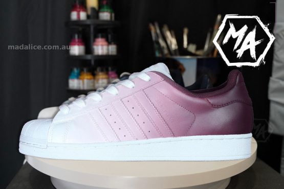 pink custom adidas supertars