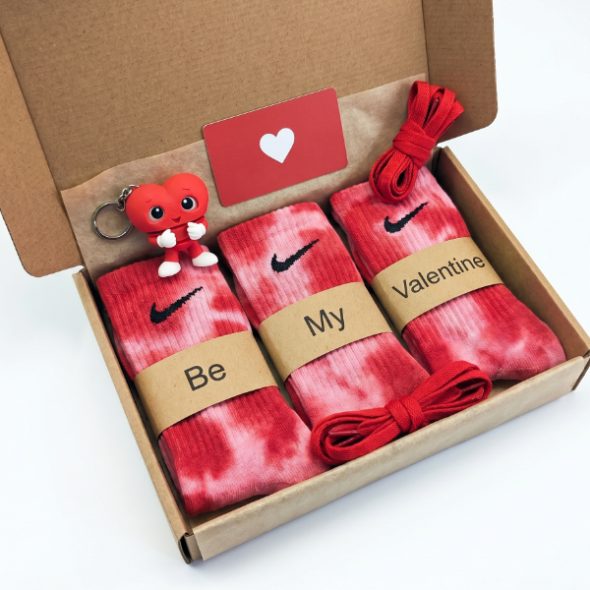Shop our custom hand-dyed red Nike crew socks gift pack. Includes 3 personalized pairs, a 3D-printed flexi heart keychain, red laces, and a mini heart card. Ready to gift!
